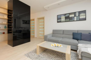 Woronicza Apartment with Balcony In Warsaw's Mokotów by Noclegi Renters